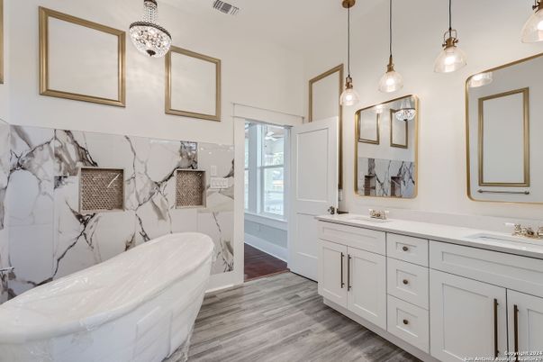 Bathroom, Dual Sink Vanities, Free Standing Baths, Interior, Marble Walls, Pendant Lights, Wood Texture Flooring