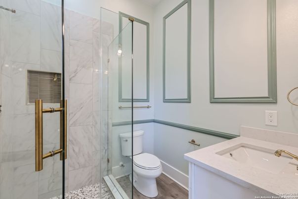 Bathroom, Glass Shower, Interior, Marble Walls, Wood Texture Flooring