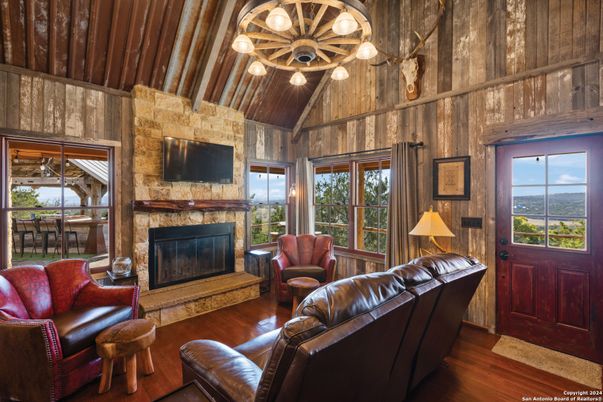 Fireplace, Interior, Living room, Pendant Lights, Stone Walls, Wooden Beams, Wooden Ceilings, Wood Texture Flooring, Wooden Walls
