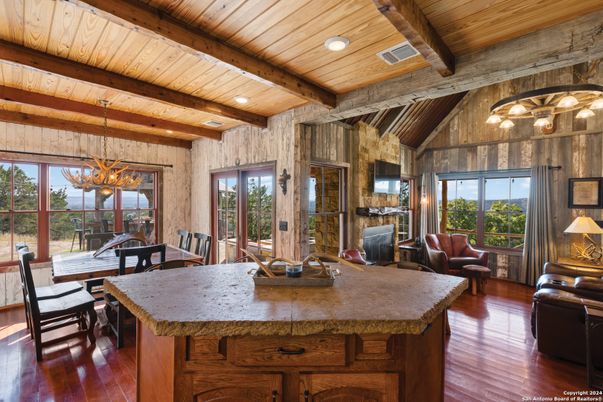 Chandelier, Dining room, Interior, Living room, Recessed Lighting, Wooden Beams, Wooden Ceilings, Wood Texture Flooring