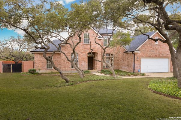 Attached, Backyard, Exterior, Facade, Brick Facade, Solar Panels, Brick Traditional