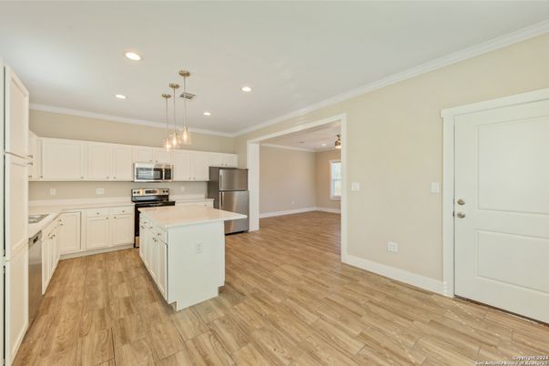 Interior, Kitchen, Pendant Lights, Recessed Lighting, Stainless Steel Appliances, Wood Texture Flooring