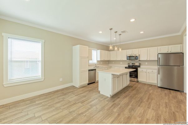 Interior, Kitchen, Pendant Lights, Recessed Lighting, Stainless Steel Appliances, Wood Texture Flooring