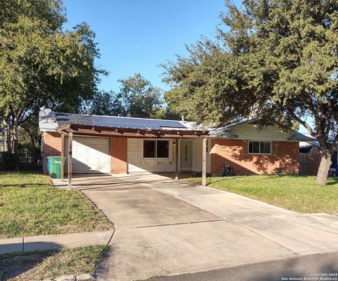 Attached, Exterior, Facade, Brick Facade, Solar Panels, Ranch