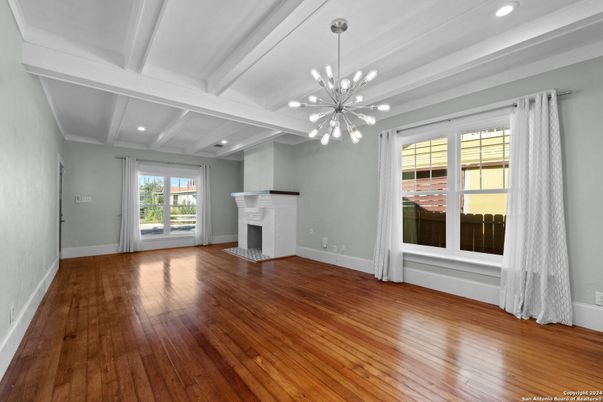 Empty room, Fireplace, Interior, Pendant Lights, Recessed Lighting, Wood Texture Flooring