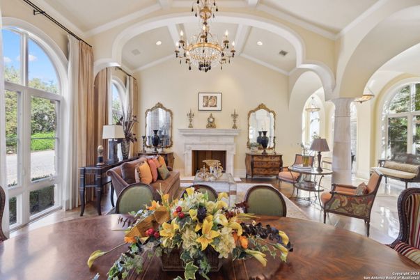 Chandelier, Dining room, Fireplace, Interior, Living room, Recessed Lighting, Wood Texture Flooring