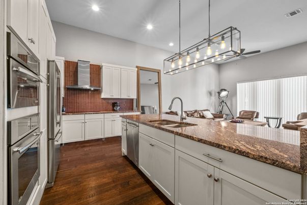 Interior, Kitchen, Pendant Lights, Recessed Lighting, Stainless Steel Appliances, Wood Texture Flooring