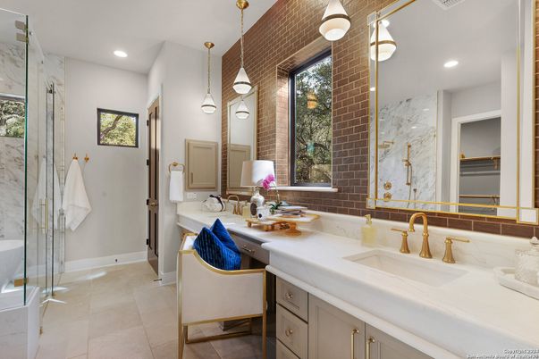 Bathroom, Dual Sink Vanities, Interior, Marble Walls, Pendant Lights, Recessed Lighting