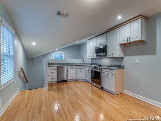 Interior, Kitchen, Recessed Lighting, Stainless Steel Appliances, Wood Texture Flooring