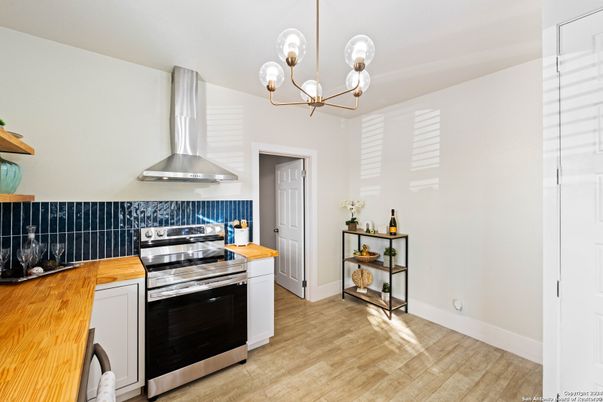 Chandelier, Interior, Kitchen, Pendant Lights, Stainless Steel Appliances, Wood Texture Flooring