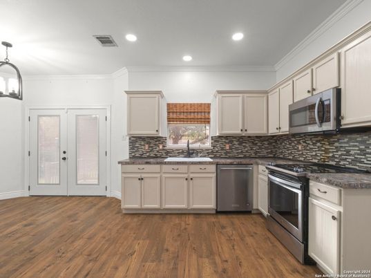 Interior, Kitchen, Recessed Lighting, Stainless Steel Appliances, Wood Texture Flooring