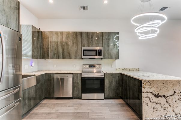 Interior, Kitchen, Pendant Lights, Recessed Lighting, Stainless Steel Appliances, Wood Texture Flooring