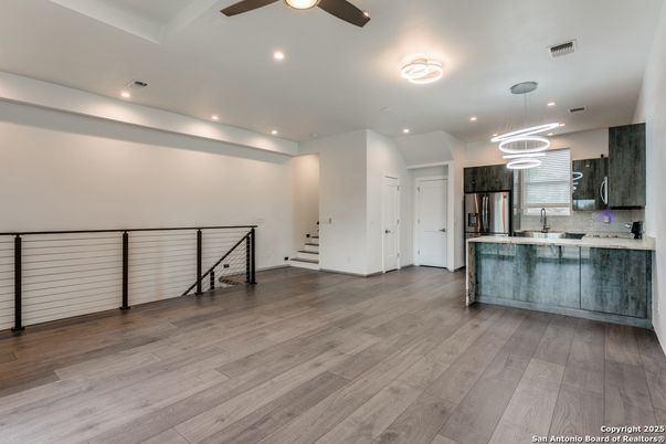 Interior, Kitchen, Pendant Lights, Recessed Lighting, Stainless Steel Appliances, Wood Texture Flooring