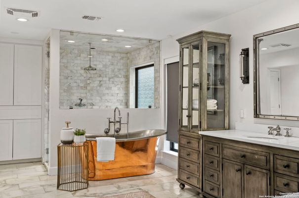 Bathroom, Dual Sink Vanities, Free Standing Baths, Glass Shower, Interior, Marble, Recessed Lighting, Stone Walls