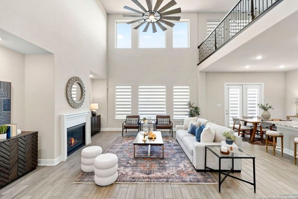 Dining room, Fireplace, Interior, Living room, Recessed Lighting, Wood Texture Flooring