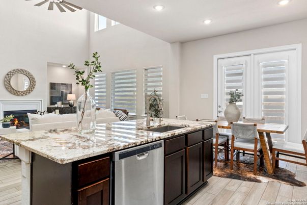 Dining room, Fireplace, Interior, Kitchen, Living room, Recessed Lighting, Wood Texture Flooring