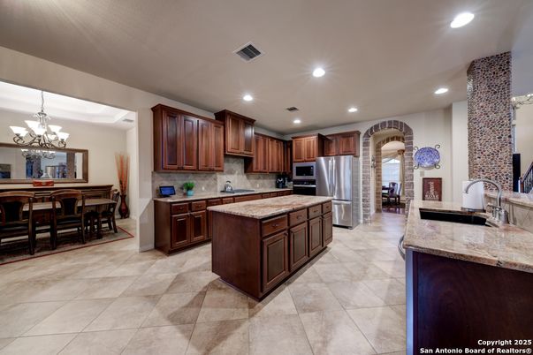 Chandelier, Dining room, Interior, Kitchen, Recessed Lighting, Stainless Steel Appliances