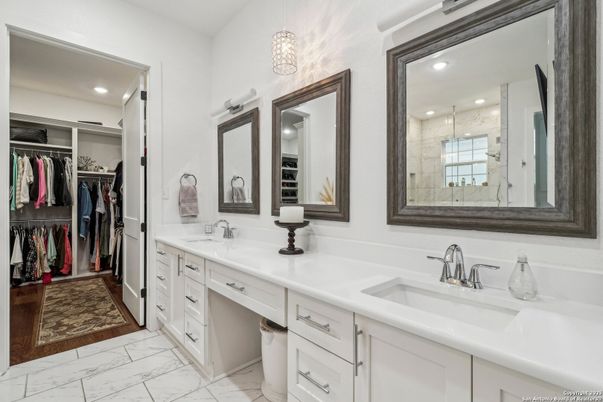 Bathroom, Dual Sink Vanities, Interior, Marble, Pendant Lights, Recessed Lighting, Walk-in Closets