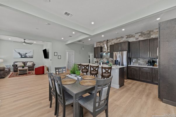 Dining room, Interior, Kitchen, Living room, Recessed Lighting, Stainless Steel Appliances, Wood Texture Flooring