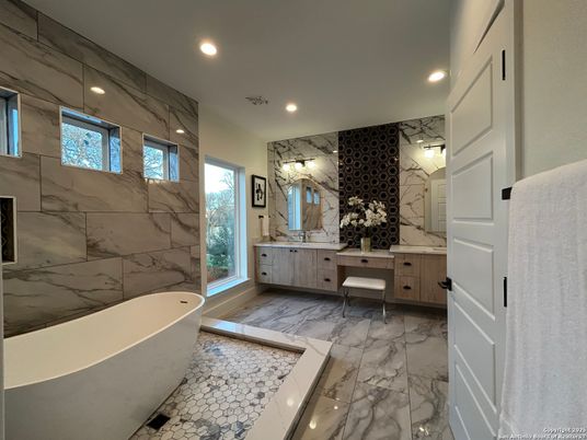 Bathroom, Dual Sink Vanities, Free Standing Baths, Interior, Marble, Marble Walls, Recessed Lighting