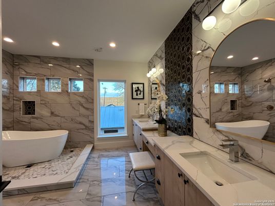 Bathroom, Dual Sink Vanities, Free Standing Baths, Interior, Marble, Marble Walls, Recessed Lighting