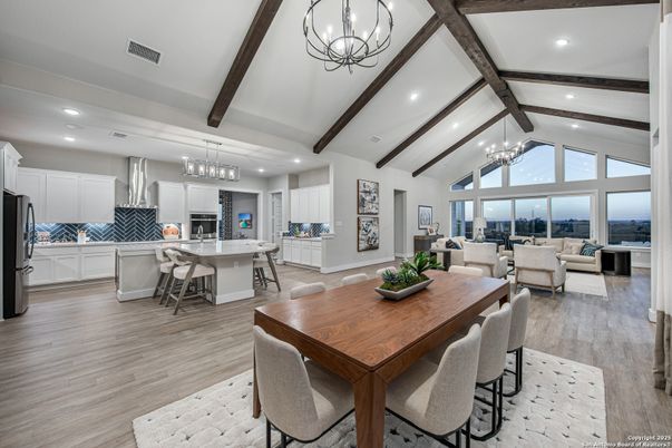 Chandelier, Dining room, Interior, Kitchen, Living room, Pendant Lights, Recessed Lighting, Stainless Steel Appliances, Wooden Beams, Wood Texture Flooring