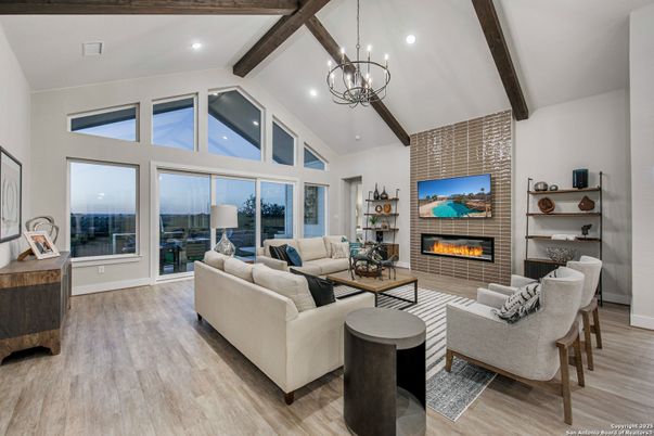 Fireplace, Interior, Living room, Pendant Lights, Recessed Lighting, Stone Walls, Wooden Beams, Wood Texture Flooring