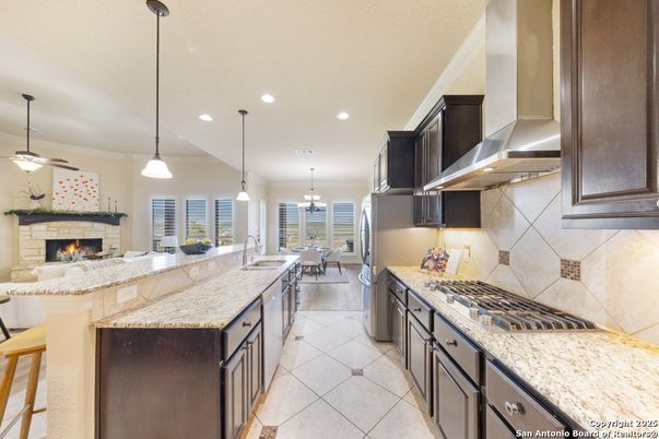 Chandelier, Dining room, Fireplace, Interior, Kitchen, Living room, Pendant Lights, Recessed Lighting