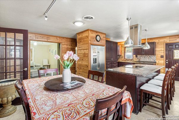 Dining room, Interior, Kitchen, Pendant Lights, Stainless Steel Appliances, Wooden Walls