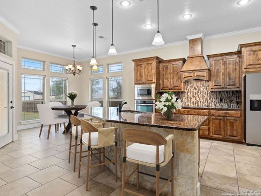 Chandelier, Dining room, Interior, Kitchen, Pendant Lights, Recessed Lighting, Stainless Steel Appliances