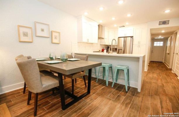 Dining room, Interior, Kitchen, Recessed Lighting, Stainless Steel Appliances, Wood Texture Flooring