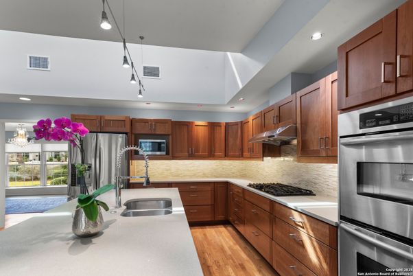 Interior, Kitchen, Pendant Lights, Recessed Lighting, Stainless Steel Appliances, Wood Texture Flooring
