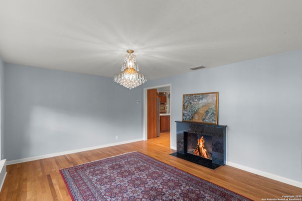 Chandelier, Empty room, Fireplace, Interior, Wood Texture Flooring