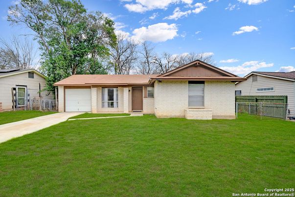 Attached, Backyard, Exterior, Facade, Brick Facade, Ranch