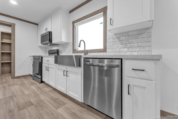 Interior, Kitchen, Recessed Lighting, Stainless Steel Appliances, Wood Texture Flooring