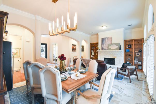 Chandelier, Dining room, Fireplace, Interior, Living room, Marble, Pendant Lights