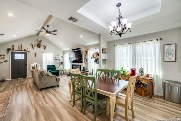Chandelier, Dining room, Fireplace, Interior, Living room, Recessed Lighting, Wood Texture Flooring