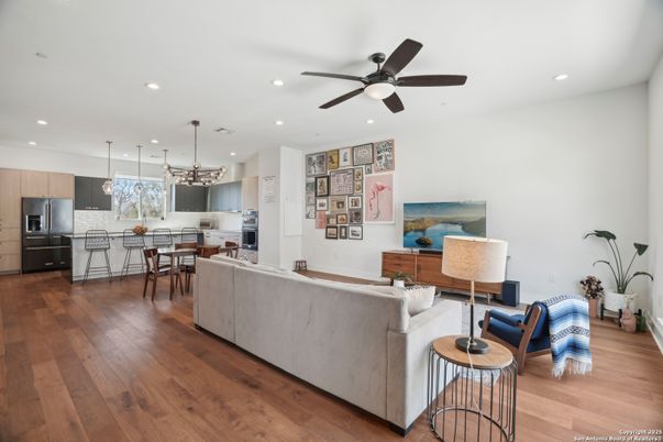 Dining room, Interior, Kitchen, Living room, Pendant Lights, Recessed Lighting, Stainless Steel Appliances, Wood Texture Flooring