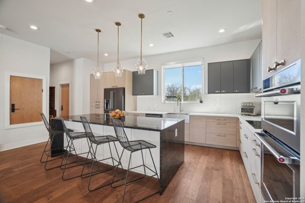Interior, Kitchen, Pendant Lights, Recessed Lighting, Stainless Steel Appliances, Wood Texture Flooring
