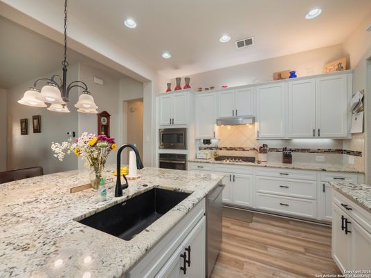 Chandelier, Interior, Kitchen, Recessed Lighting, Stainless Steel Appliances, Wood Texture Flooring