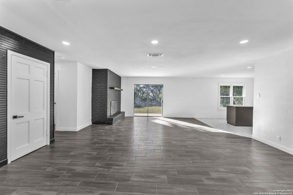 Empty room, Fireplace, Interior, Recessed Lighting, Wood Texture Flooring