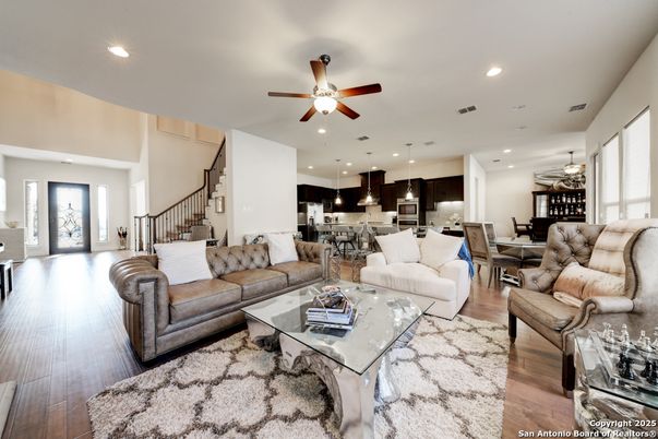 Dining room, Interior, Kitchen, Living room, Pendant Lights, Recessed Lighting, Stainless Steel Appliances, Wood Texture Flooring