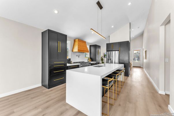 Interior, Kitchen, Pendant Lights, Recessed Lighting, Stainless Steel Appliances, Wood Texture Flooring