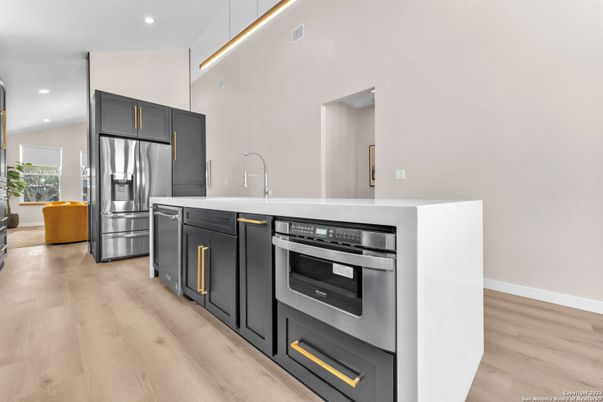 Interior, Kitchen, Recessed Lighting, Stainless Steel Appliances, Wood Texture Flooring