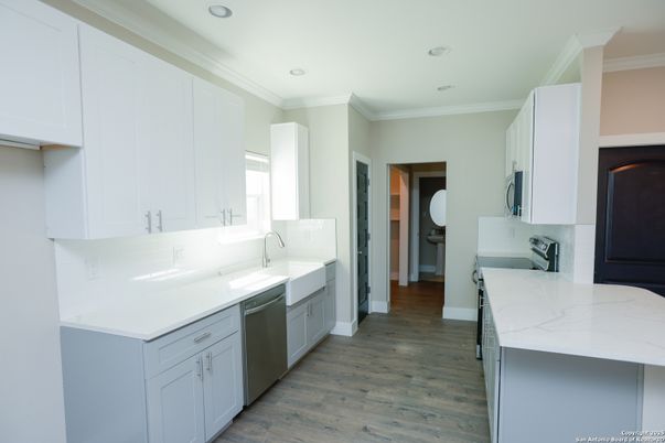 Interior, Kitchen, Recessed Lighting, Stainless Steel Appliances, Wood Texture Flooring