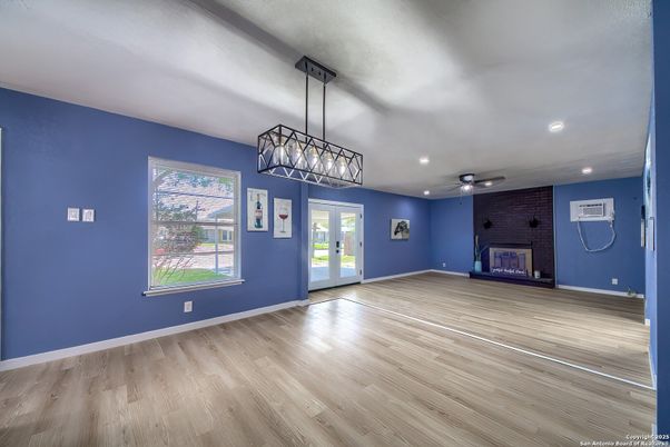 Empty room, Fireplace, Interior, Pendant Lights, Recessed Lighting, Wood Texture Flooring