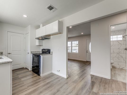 Interior, Kitchen, Marble Walls, Recessed Lighting, Wood Texture Flooring
