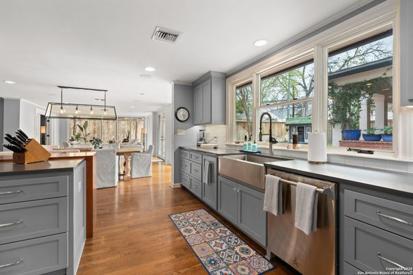 Dining room, Interior, Kitchen, Pendant Lights, Recessed Lighting, Stainless Steel Appliances, Wood Texture Flooring