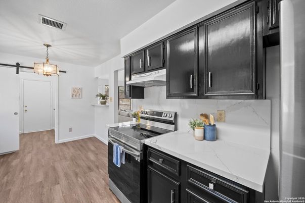 Interior, Kitchen, Pendant Lights, Stainless Steel Appliances, Wood Texture Flooring