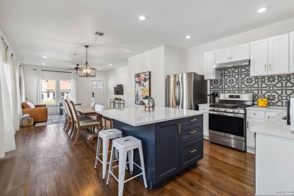 Dining room, Interior, Kitchen, Living room, Pendant Lights, Recessed Lighting, Stainless Steel Appliances, Wood Texture Flooring